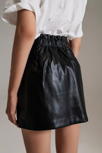 Load image into Gallery viewer, BLACK FAUX LEATHER MINI SKIRT WITH BOW
